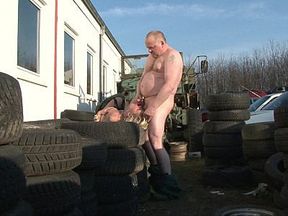 German Milf Fucks in The Middle of The Tires Watched by All Their Colleagues Coming