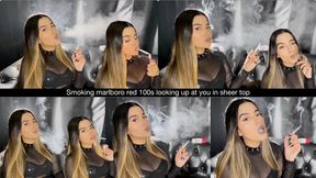 Smoking marlboro red 100s looking up at you in sheer top