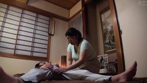 Japanese older mom helps with an erection after breast massage