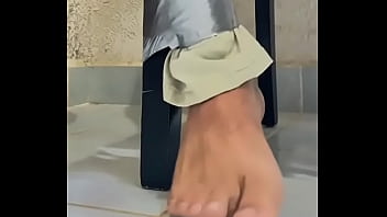 Casual gay man with his feet tape tied (Part 1)