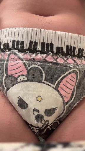 Solo amateur plays with her boobs and messy diaper ass