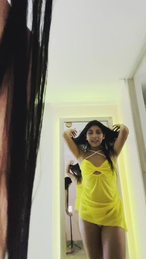 Blonde woman in yellow dress