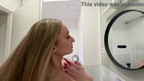 Hot college girl shows off her massive-assed mini-skirt in the bathroom