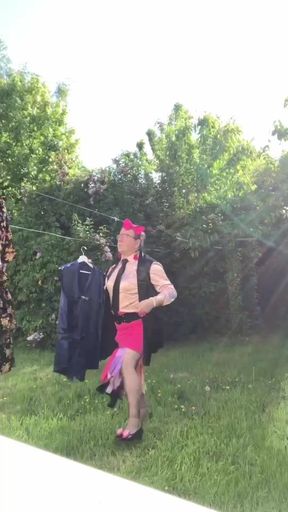 In an outfit with a pink skirt for an evening and going to get my laundry outside.