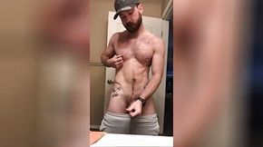 Tatted jock gets off on his own sweaty pits after the gym