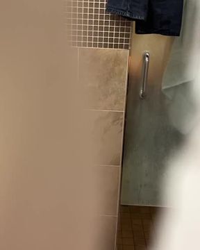 Courtain’s hole to spy on this guy having fun in his shower.