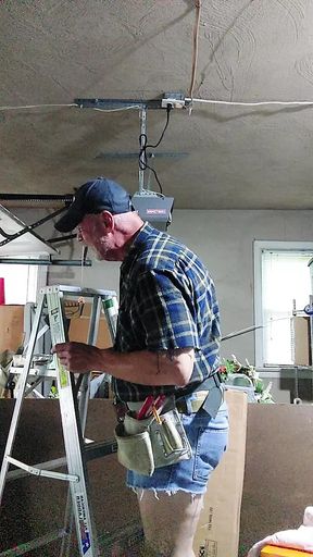 Repairing garage door to catch a voyager