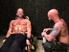 Soldier Drake interrogates another soldier Dirk