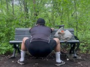 Biker In Spandex Stretching At The Park