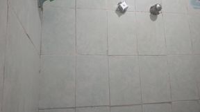 I'm having a great time masturbating in the shower while I'm bathing in nice, warm water