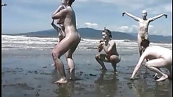 Arousing beach partying with nude babes and naked studs