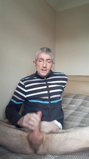 Masturbating in Tracksuit Top.