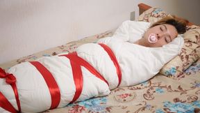 Sofi_ Mummification with a white blanket_ Part 1