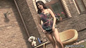 Nasty Lady Dee is busy with a dildo in her garden