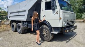 Nastya exploring and driving an old dump truck