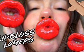 Red Sticky Messy Lipgloss Layers and Pouting Kisses