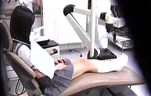 Unsuspecting beauty at the dentist