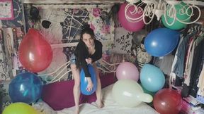 Blow to pop of a blue balloon