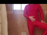 Spandex boy getting showering and jacking off in red catsuit