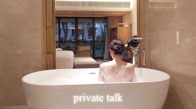 Sleek Japanese coed luxuriates in a milky public bath