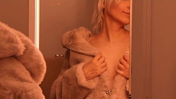 Blonde tries on different outfits and does a blowjob