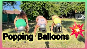 Competition Popping balloons with our asses
