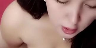 Asian teen Cece Momoshan jilating her pussy