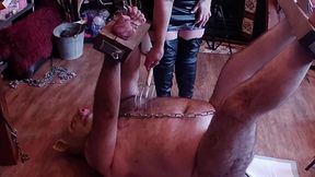 Domina Satana and Satana's Piggy in Stocks