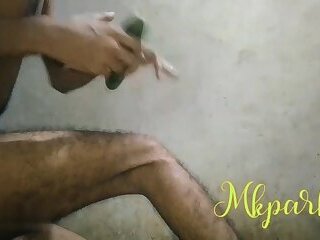 Trying to put cocomber in my ass.