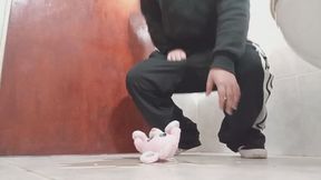 Lola pees on him from behind.