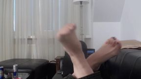 Xenia's feet dangling to the music