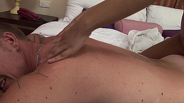 Thai masseuse Sunisa gives oil massage and her oiled pussy in hotel room