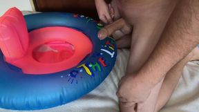 Playing with inflatable swim ring