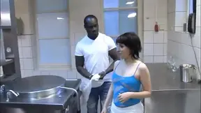 German babe gives a deepthroat blowjob in the kitchen