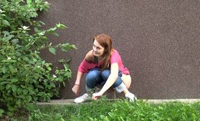 Shy and nervous redhead pees outside