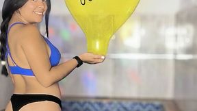 Who doesn't like popping balloons in a sexy bikini inside a hot tub?