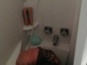 Milf naked in the shower gives a furious Pitbull a bath