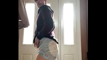 Diaper Boy Showing Off His Wet Diaper