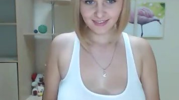 Dirty minded teen babe is showing her very big boobs, in front of the webcam
