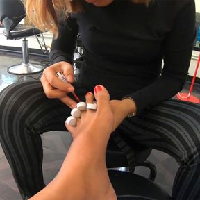 Pedicure for the Asian teen girlfriend and a footjob by her afterwards