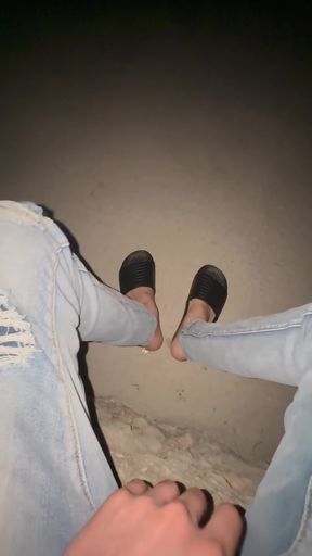 Young blonde twink plays with his teasing feet while sitting alone