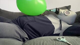 Masked latex twink breathplay with heavy breathing and big balloon control