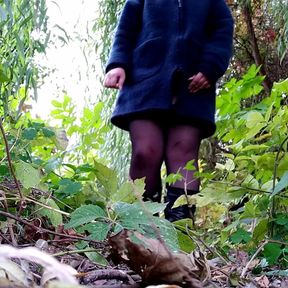 Russian milf in boots and sexy stockings pissing outdoors