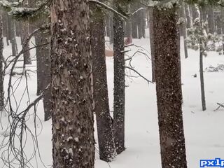 Tattooed Redhead Nude in a Snowstorm