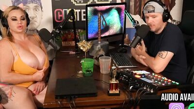 Blonde pornstar with a humongous tits is having a podcast interview