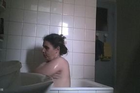 big boobed stepmom spied in the bathroom