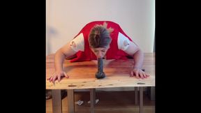 Sissy Riding Black Dildo on Table