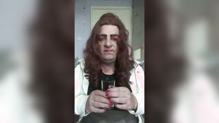 Real homemade video of a crossdresser gulping down a piss shower