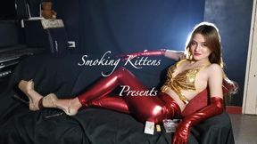 Allie smoking in red and gold