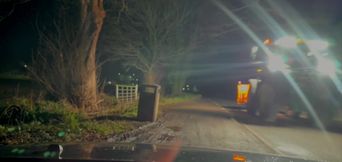 Totally nude barefoot in public . Hiding from gritter